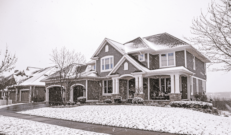 Modern Kansas City home with durable James Hardie siding in winter.